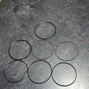 7 black/silver bangles